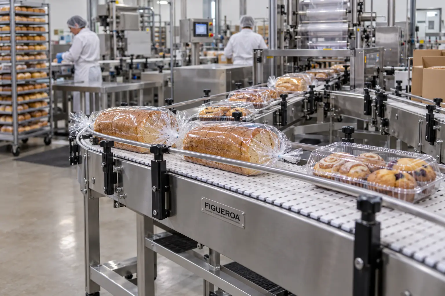 FIC-branded conveyor carrying packaged bakery products